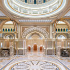 Grand interior view of the main hall at Qasr Al Watan, a cultural landmark in Abu Dhabi, UAE.