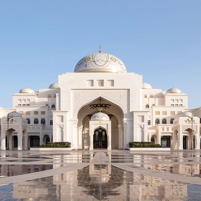 Exterior view of the main hall entrance at Qasr al Watan, a cultural landmark in Abu Dhabi, UAE.