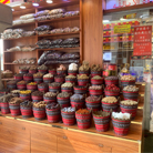 Colorful display of spices in Dubai's vibrant spice souk, offering a sensory experience for visitors.