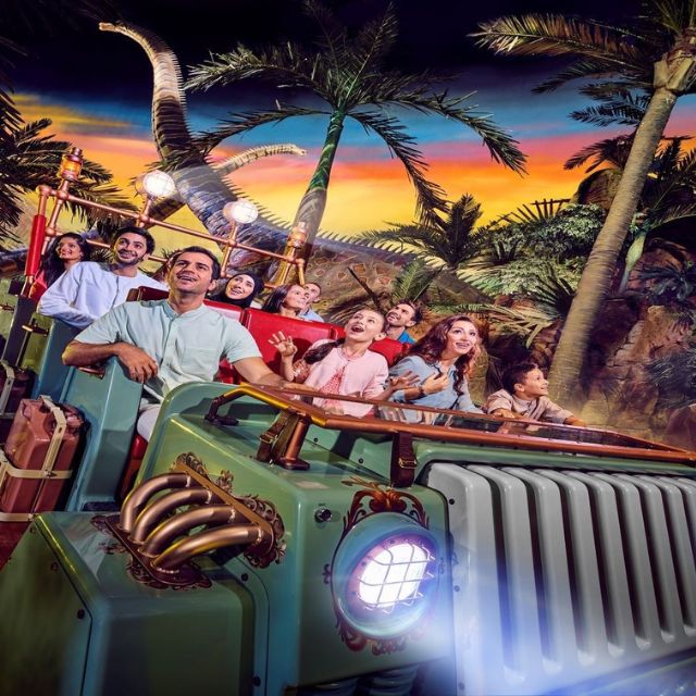 A family and couple immersed in the excitement of The Forbidden Territory at IMG Worlds of Adventure