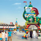 Excited families experiencing the joy of entering LEGOLAND Dubai at Dubai Parks and Resorts