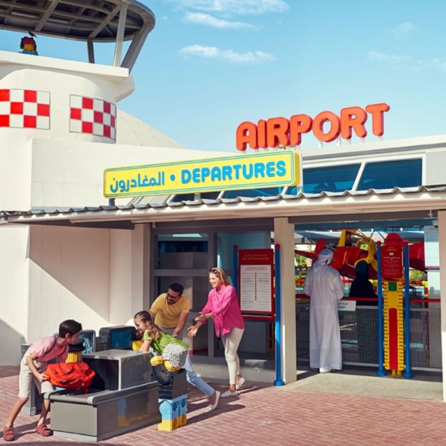 A family enjoying the interactive City Airport section at LEGOLAND Dubai