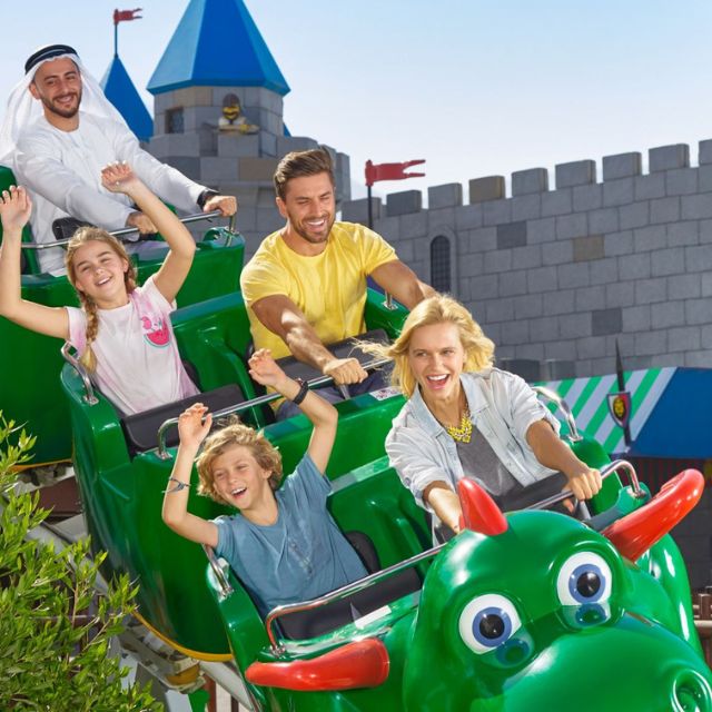 Close-up shot of a family experiencing the excitement of the Dragon Apprentice rollercoaster