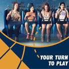 Thrill-seeking friends on a high-octane mini drop tower at Real Madrid World