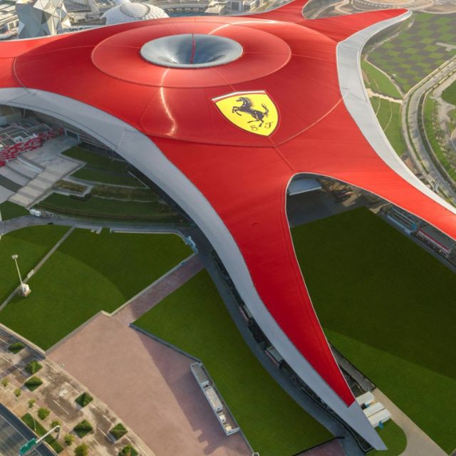 Panoramic aerial view showcasing the iconic architecture and layout of Ferrari World Abu Dhabi