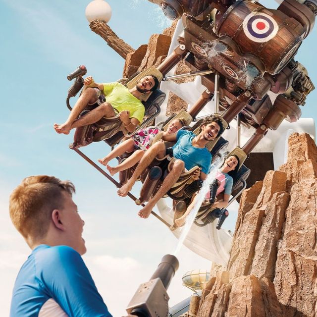 Water fight fun: Friends enjoying a splash battle on the Bandit Bomber ride at Yas Waterworld Abu Dhabi