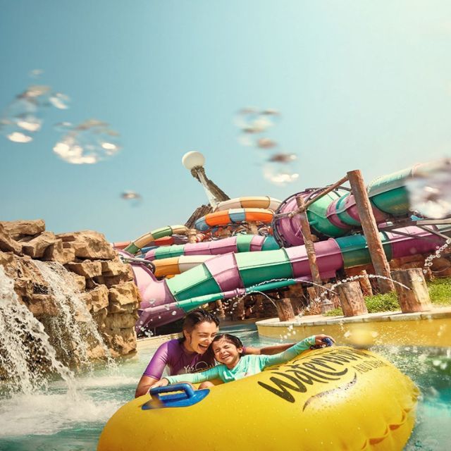Relaxing moment: Mother and daughter enjoying the Al Raha River at Yas Waterworld Abu Dhabi